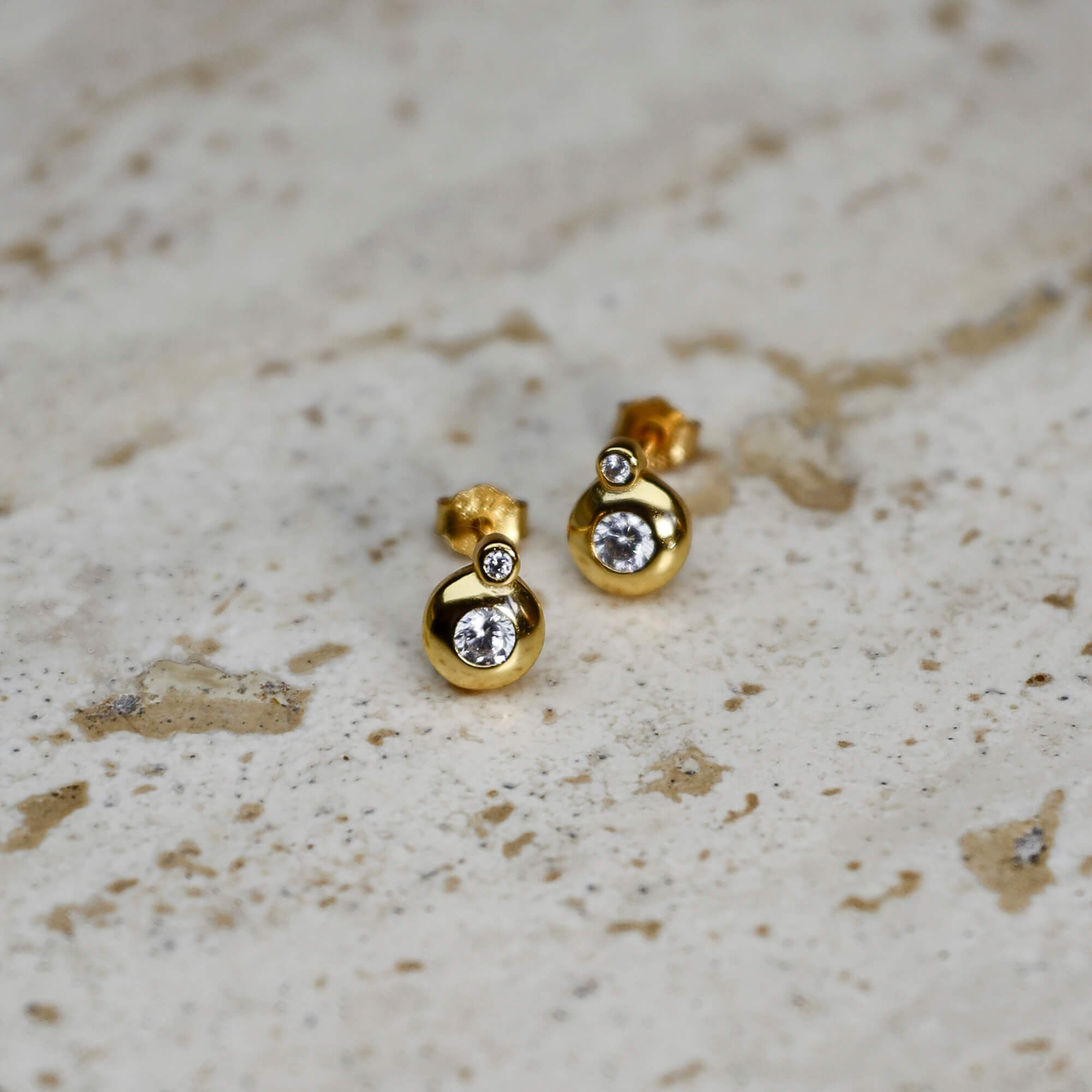 Gold-plated on sterling silver double bezel zirconia stud earrings, delicate modern sparkle. - Solinu Jewellery