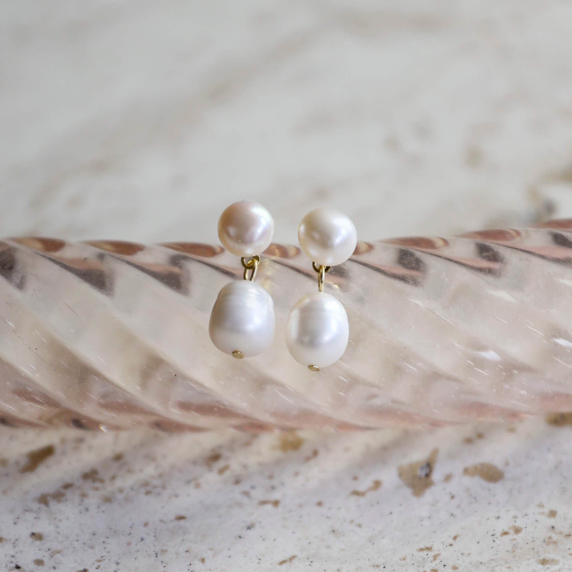 Gold-plated on sterling silver drop earrings featuring double freshwater pearls, elegant timeless occasion style. - Solinu Jewellery 