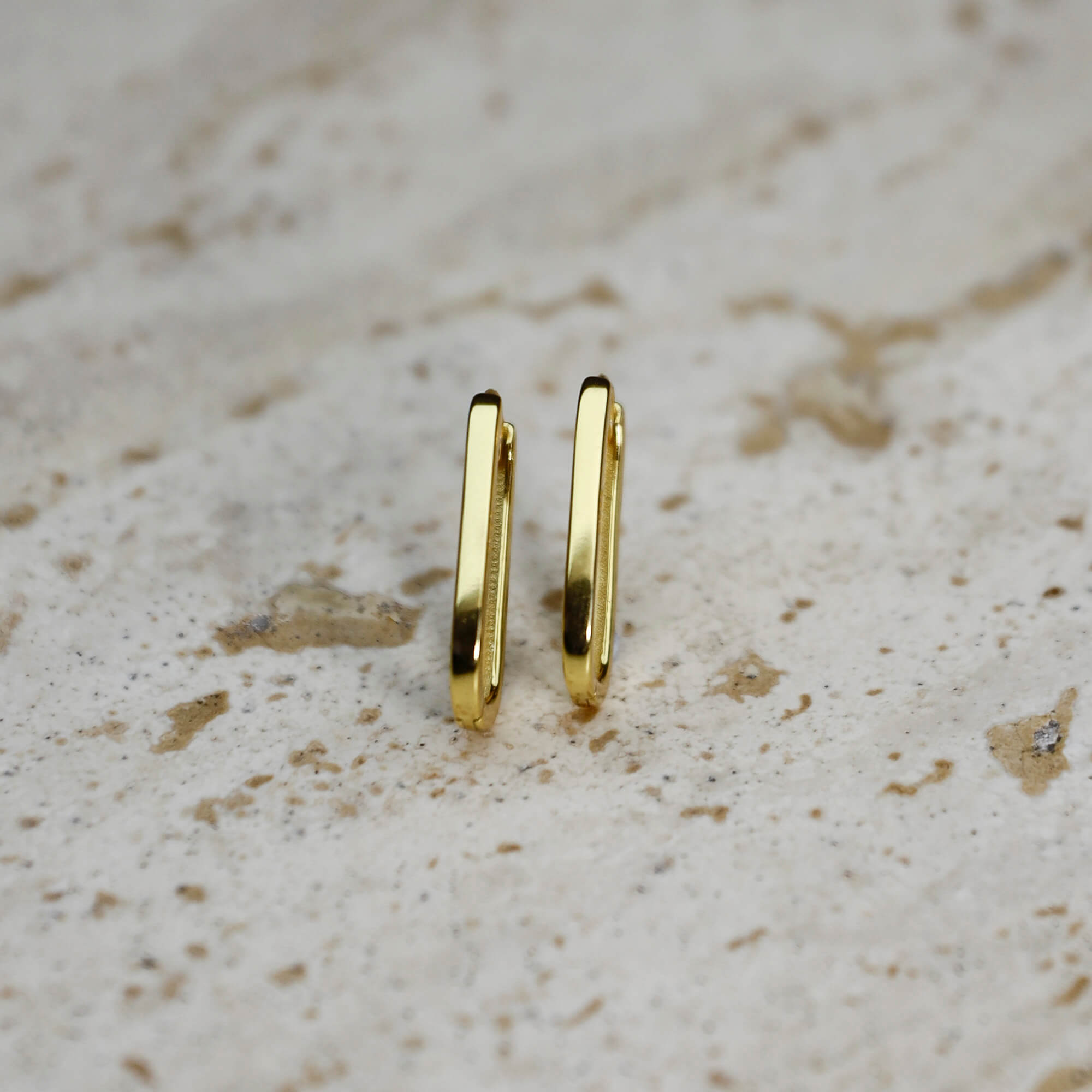 Gold-plated on sterling silver elongated hoop earrings with sleek minimalist silhouette, everyday jewellery essential. - Solinu Jewellery