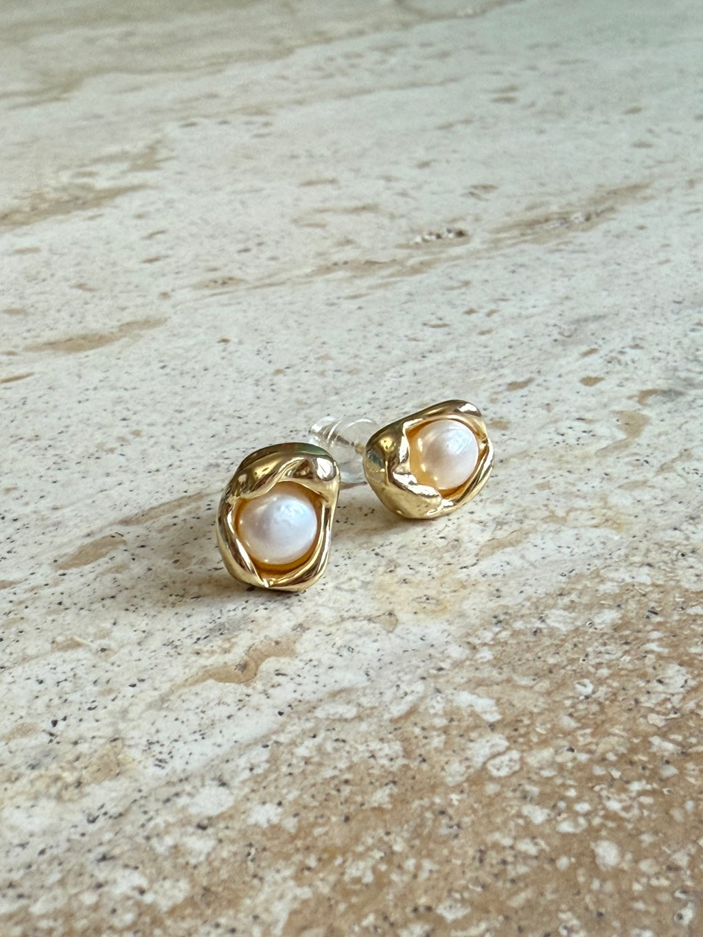 Gold earrings with pearl centers modern bridal look